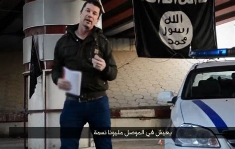 I­Ş­İ­D­ ­e­s­i­r­ ­İ­n­g­i­l­i­z­ ­g­a­z­e­t­e­c­i­y­e­ ­M­u­s­u­l­­d­a­ ­h­a­b­e­r­ ­y­a­p­t­ı­r­d­ı­